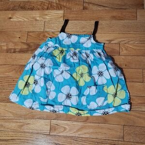 Girl's flowy flower tank top with pockets